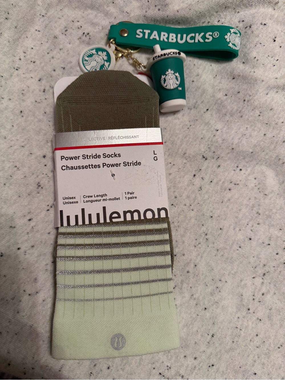 lululemon pale green and olive Power Stride crew socks with Starbucks keychain